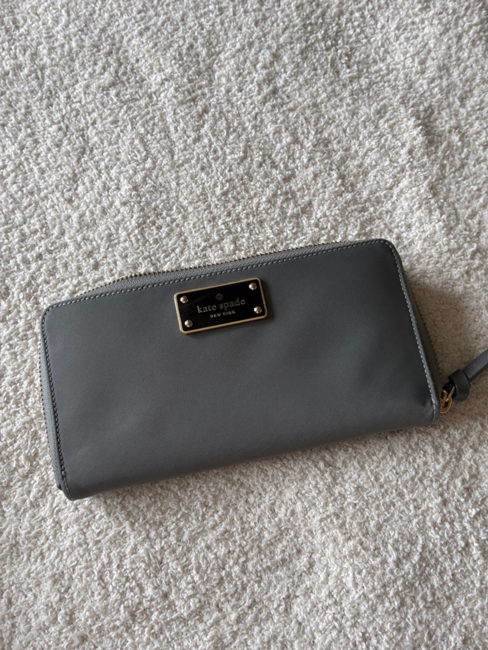 kate spade gray Zip-Around Wallet with Gold Plaque